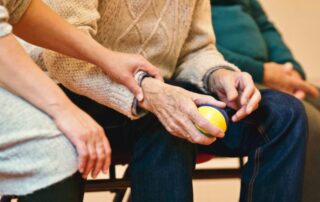 Elderly men and women in nursing home
