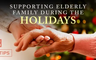 Close-up of an adult child gently holding an elderly parent’s hand in front of a softly lit Christmas tree, illustrating support, connection, and senior-friendly holiday care